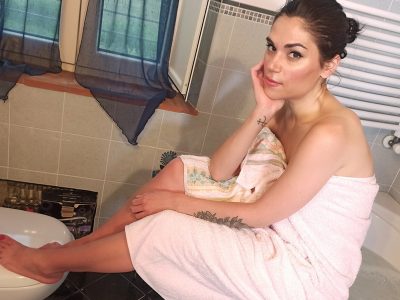 Brunette bombshell Chiara looks hotter wearing towel in the bathroom